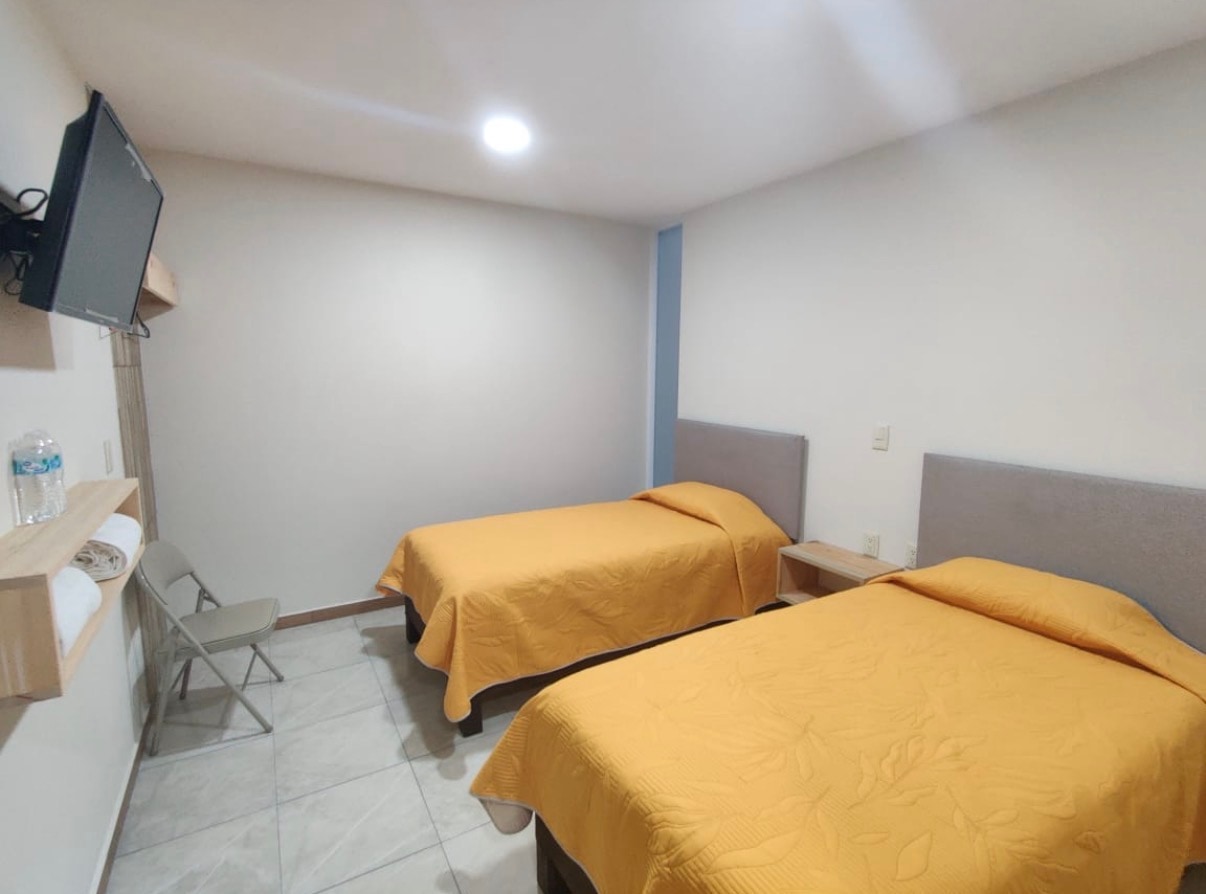 Habitación Twin con otra lectura del mobiliario y distribución.